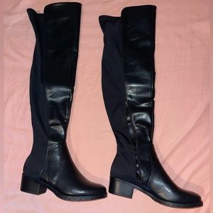 Knee high black leather boots
